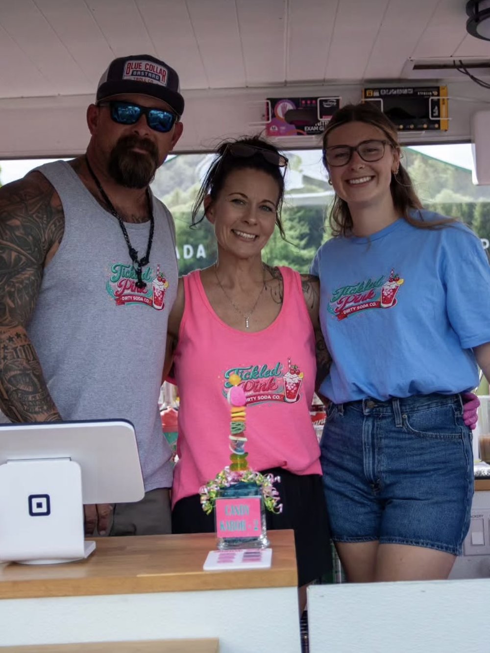 The Tickled Pink team behind the register
