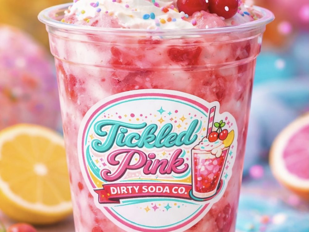 Strawberries and cream dirty soda with whipped cream and cherries