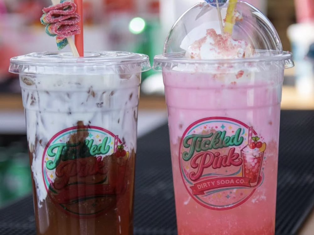 Two Tickled Pink drinks with fun straw toppers